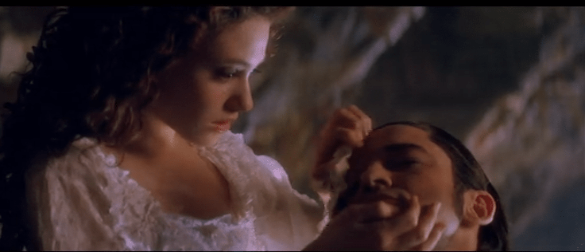 Christine Removes the Mask.png